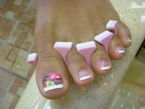 Fashionable and stylish nail extension on the legs