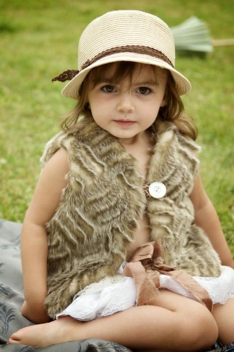 Fur vest for a girl is a stylish piece of a small fashionable wardrobe